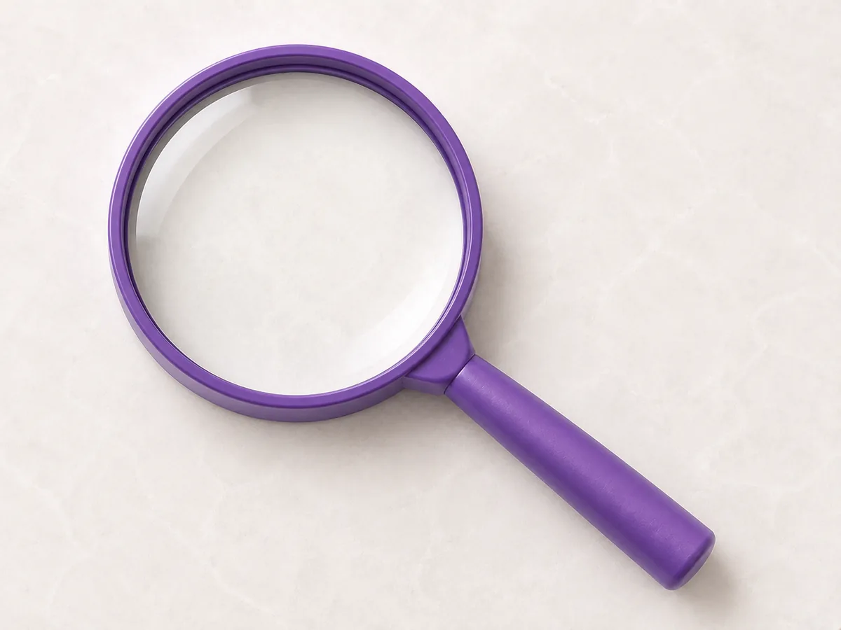 A magnifying glass - a needle result that could not be called either way has to be looked at again